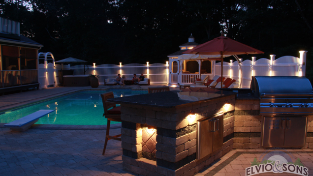 Low voltage lighting can enhance the features of any outdoor living space at night.
