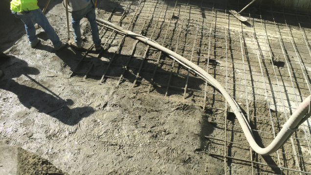 Applying new plaster during gunite pool renovation.