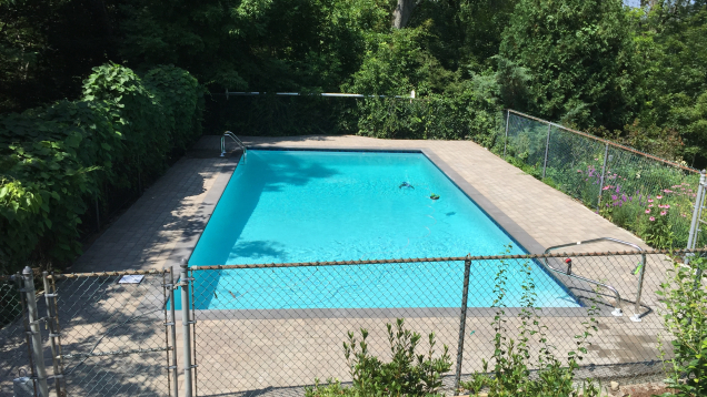 Completed gunite pool renovation with plaster finish.