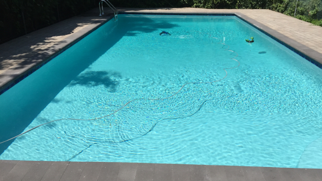 Completed gunite pool renovation with plaster finish.