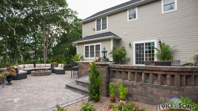 Unilock block wall with paver patio.