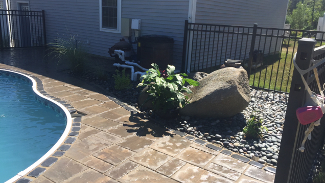 Paver patio and in-ground liner pool coping.